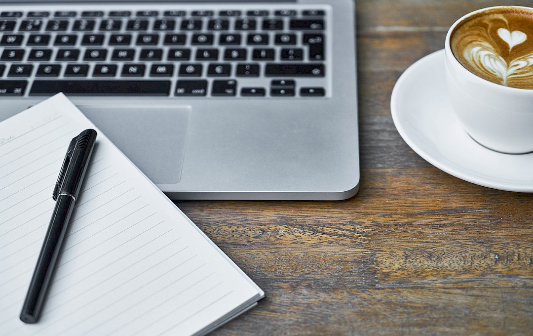 CV Writing notes and laptop